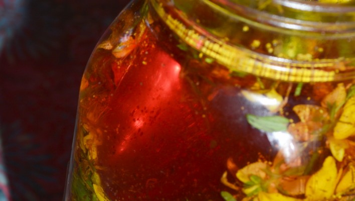 St Johns wort in a jar pink