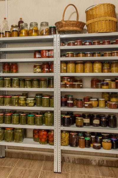 Pantry shelves full of canned food