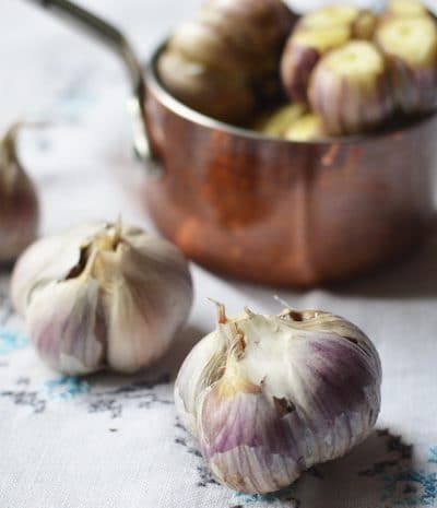 Roasted garlic is sweet, and complex, without the burning sensation of raw garlic. Roasted garlic has been cooked at low temperatures that caramelize the sugars, naturally occurring in all alliums. This gives roasted garlic a complex, delicious, warmth, not found on the supermarket shelf. Top chefs know this and incorporate roasted garlic in sauces, soups, dips, and meat dishes. But you don't have to spend big money at a fancy restaurant to enjoy the flavours of roasted garlic. It's easy to make it at home, and doesn't even take extra time.