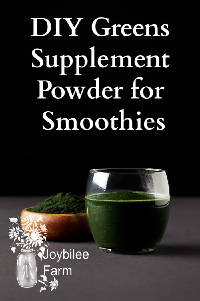 green drink on black and grey background with green powder in a wooden dish.