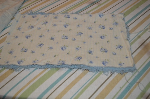 Two layers of cloth pinned together to make paper towel alternatives