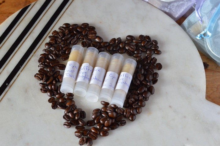 Are you tired of looking in the mirror and seeing baggy eyes, dark circles, and that “old lady” look? This DIY eye cream has natural caffeine to tighten up under eye skin, brighten those dark circles and reduce puffiness and water retention. While it won’t make you feel 20 years younger or guarantee 8 hours of sleep, it will help reduce that tired eye look that comes from late nights, not enough sleep, or water retention. Similiar commercial products sell for over $25 for just an ounce. But you can invest in the ingredients and make your own wonderfully fresh and nourishing beauty products for a fraction of the cost of commercial skincare products.