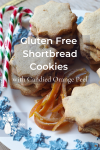 Shortbread cookies and candied orange peel on a fancy plate